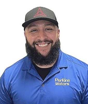 Service Advisor Julian Sandoval in Service at Perkins Motors